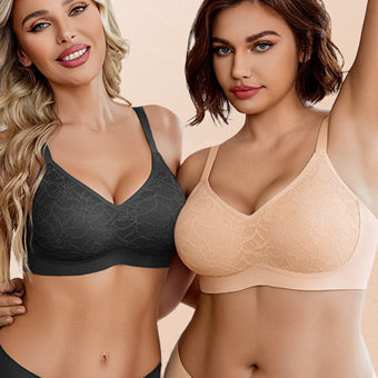 Two women modeling seamless, wire-free bras in black and nude.
