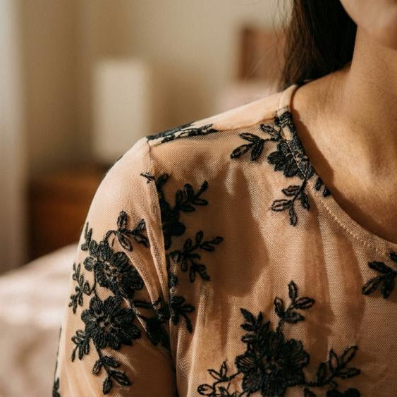 Tattoo Illusion: The Art of Embroidery on Nude Mesh