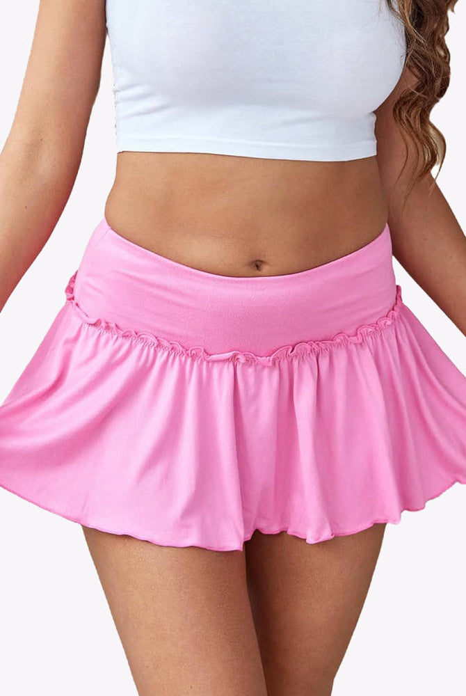Pink ruffle mini skirt with stretchy waistband, a cute and comfortable lingerie option.