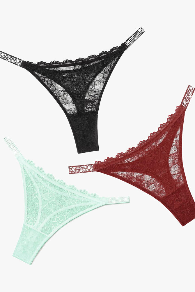Lace thongs with rhinestone straps in black, burgundy, and mint green. Sexy lingerie.