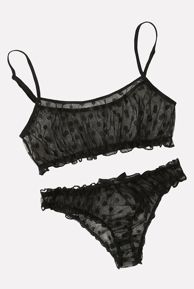 Black polka dot mesh lingerie set with ruffles. Sheer bra and panty designed for confidence.