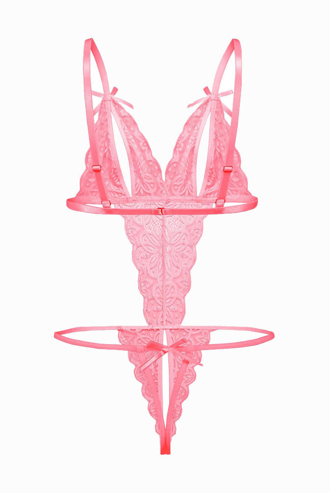 Pink lace bodysuit with open cup, backless design, and bow details. Sexy lingerie for a hot night.
