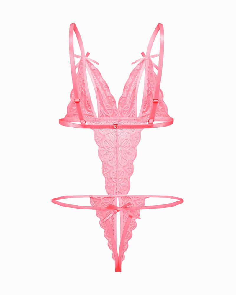 Pink lace bodysuit with open cup, backless design, and bow details. Sexy lingerie for a hot night.