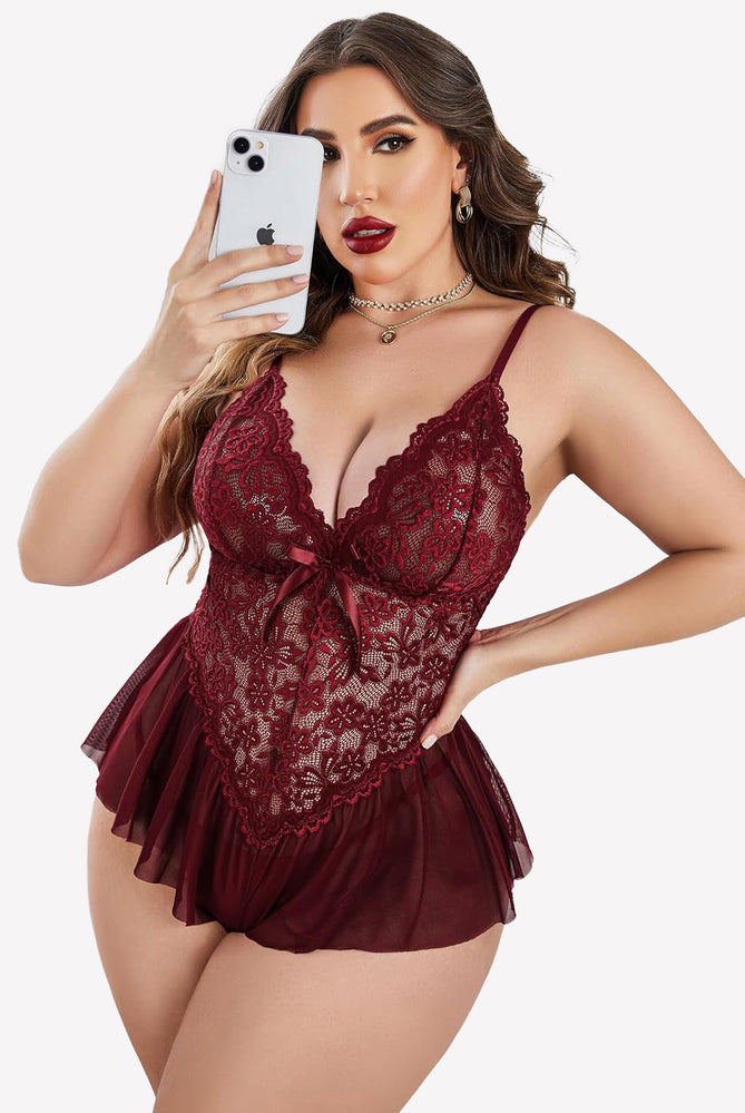 Plus size model in burgundy lace bodysuit with adjustable straps, teddy lingerie