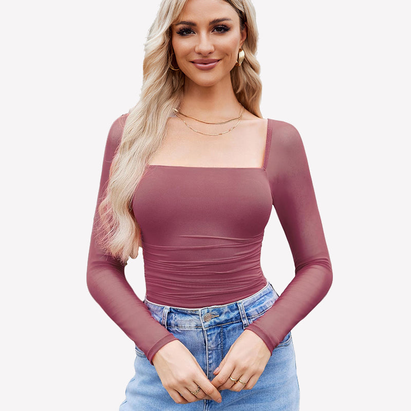 Mauve mesh square neck bodysuit with ruched detail, long sleeve. Model in jeans and gold jewelry.