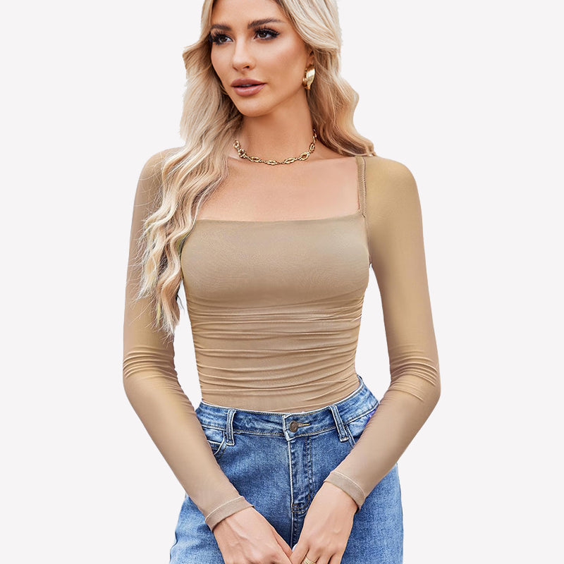 Beige square neck mesh bodysuit with long sleeves, ruched detail, jeans and gold jewelry. Shapewear.