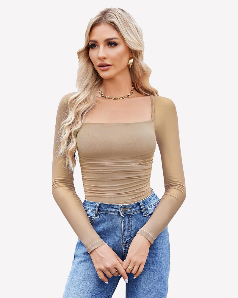 Beige square neck mesh bodysuit with long sleeves, ruched detail, jeans and gold jewelry. Shapewear.