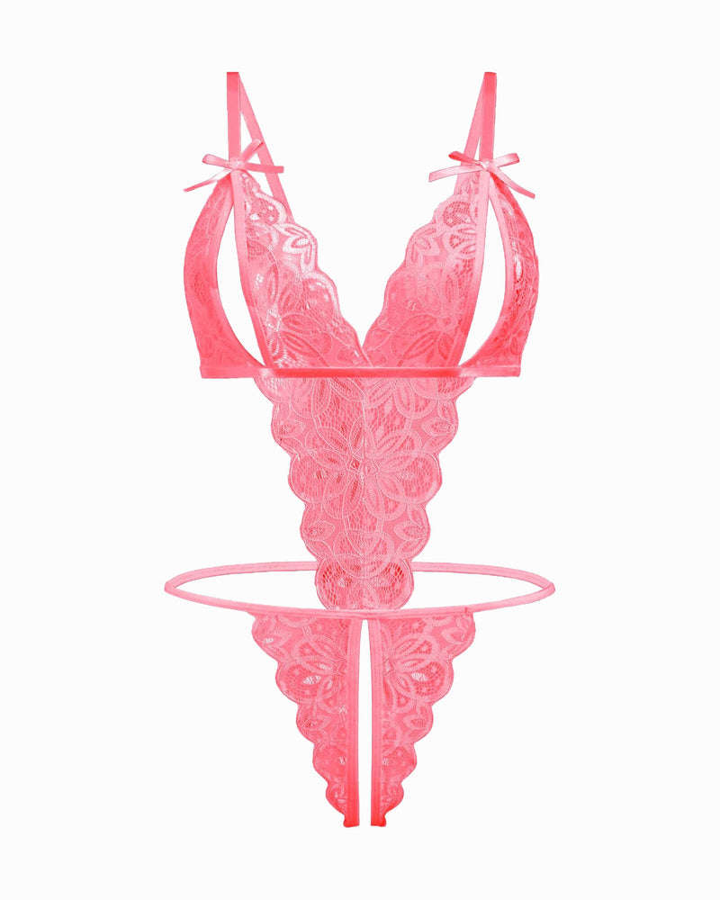 Pink lace bodysuit with open cup, bow details, and backless design. Sexy lingerie for a hot night.