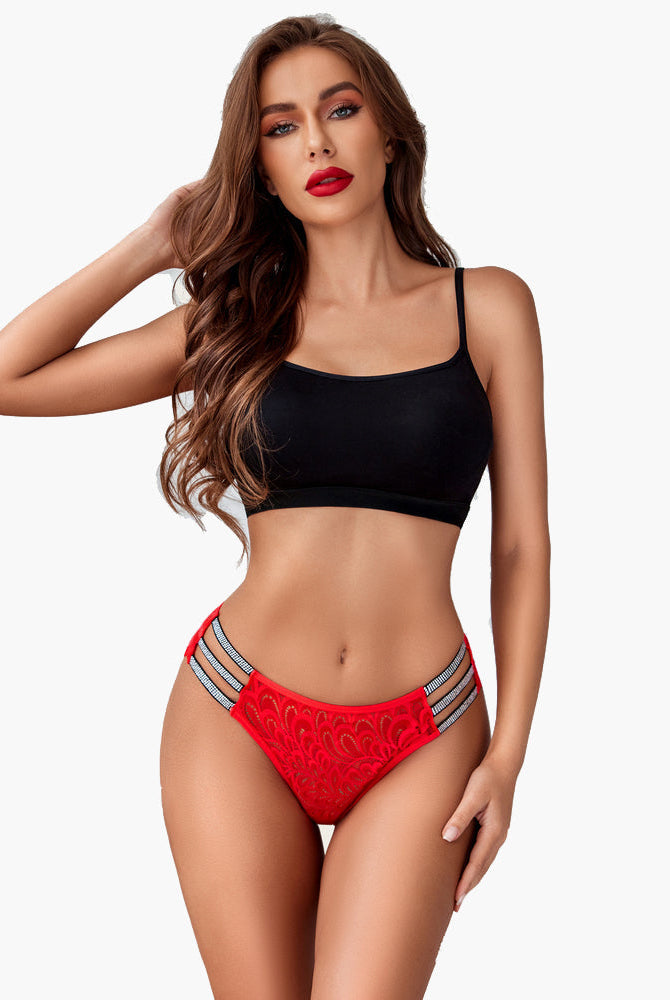 Red lace cheeky underwear with rhinestone straps and delicate lace. Sexy and confident lingerie.