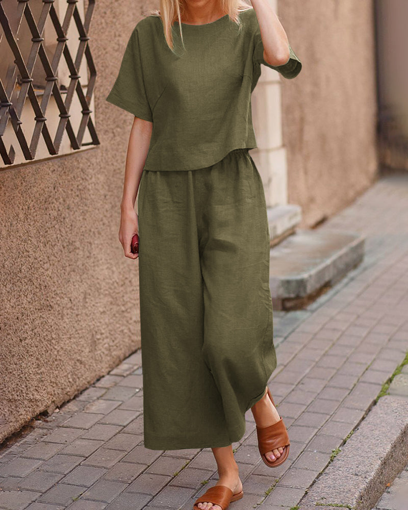 Olive green linen two-piece set for women, casual style. Loose fit top and wide leg pants.