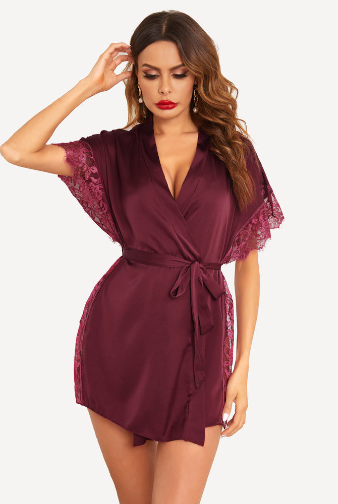 Burgundy satin sleepwear robe with lace trim and belt, perfect for luxurious sleepwear