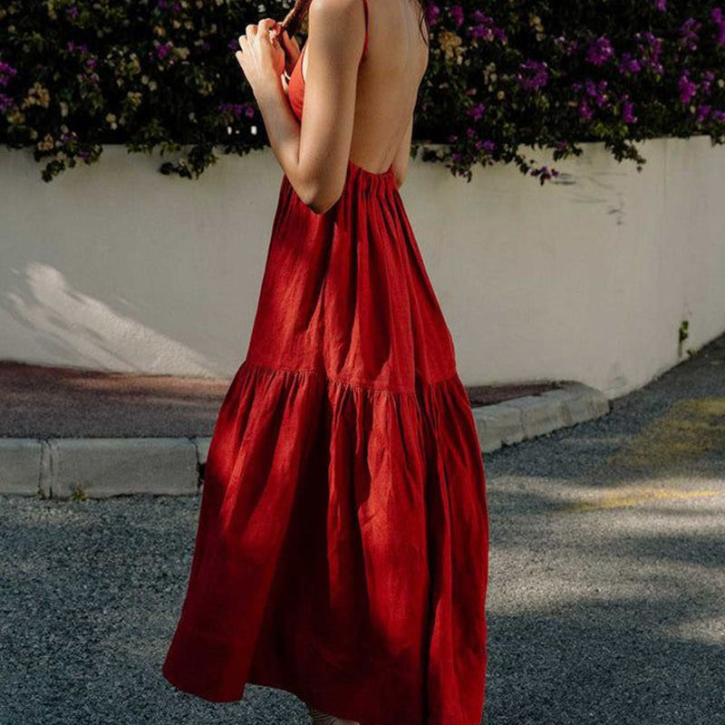 Red cotton Big Swing Backless Maxi Dress with flowing skirt and open back, perfect for vacation.