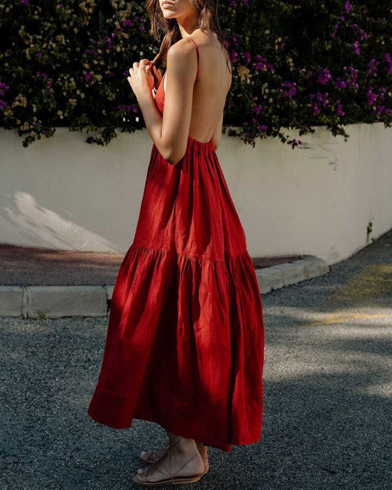 Red cotton Big Swing Backless Maxi Dress with flowing skirt and open back, perfect for vacation.