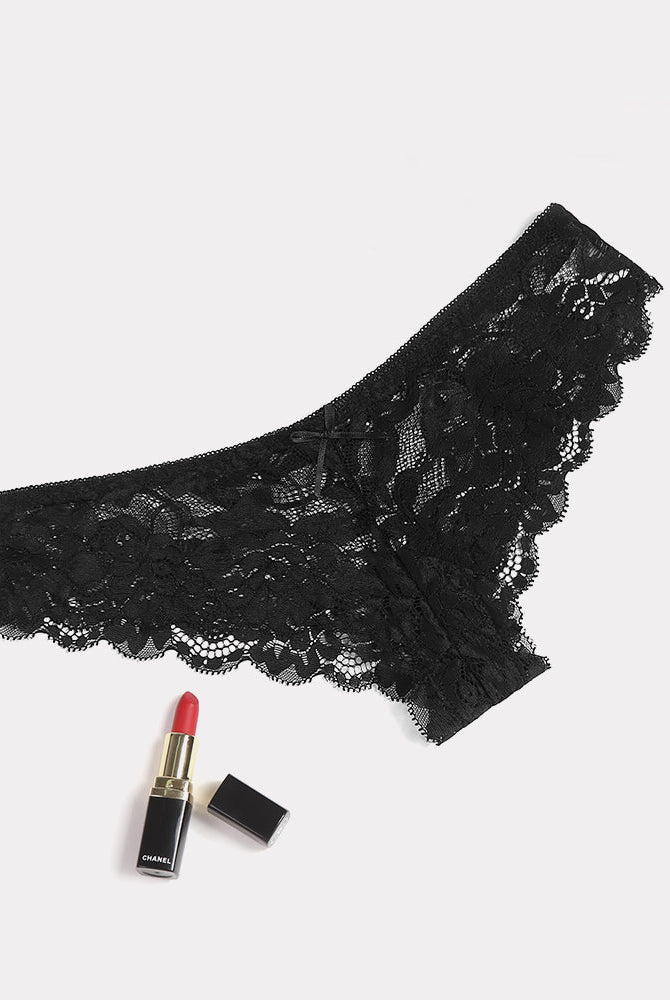 Black floral lace hipster panties with Chanel lipstick. Sheer, stylish, and comfortable lingerie.