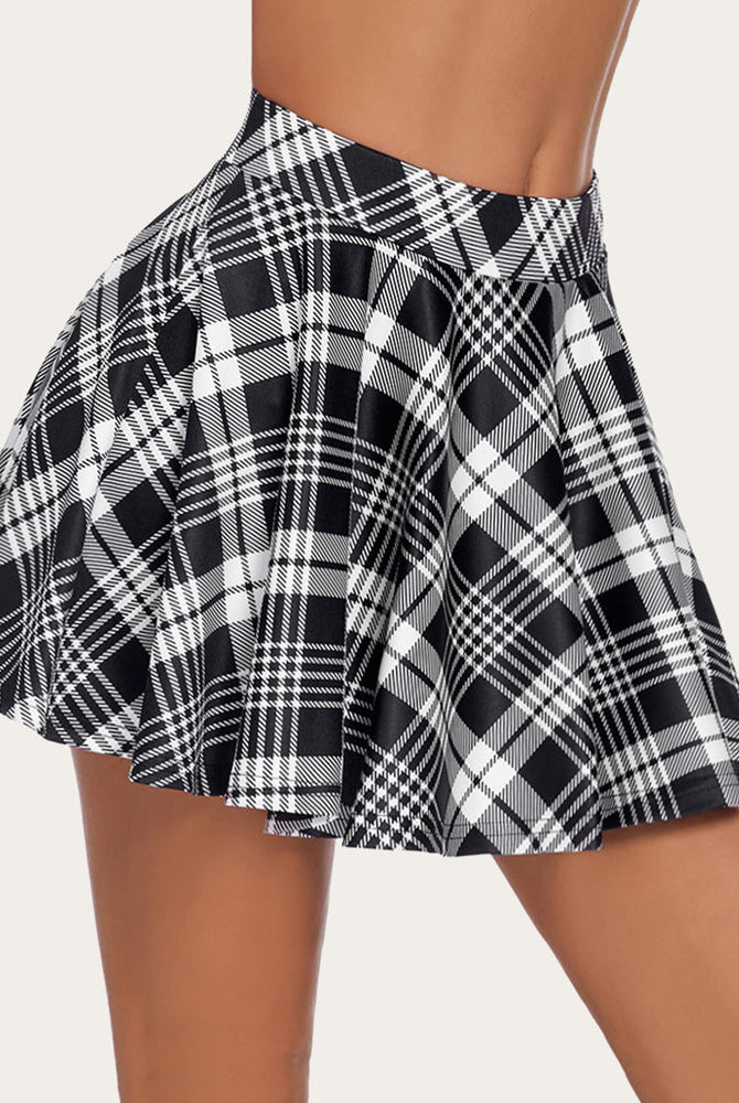 Black and white plaid A-line mini skirt. Comfortable and stylish high-waisted flared skirt.