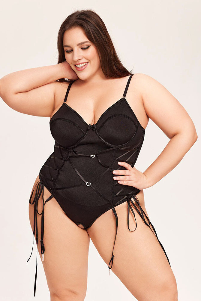 Black tummy control bodysuit with garter belt for women, adjustable straps, and underwire cups