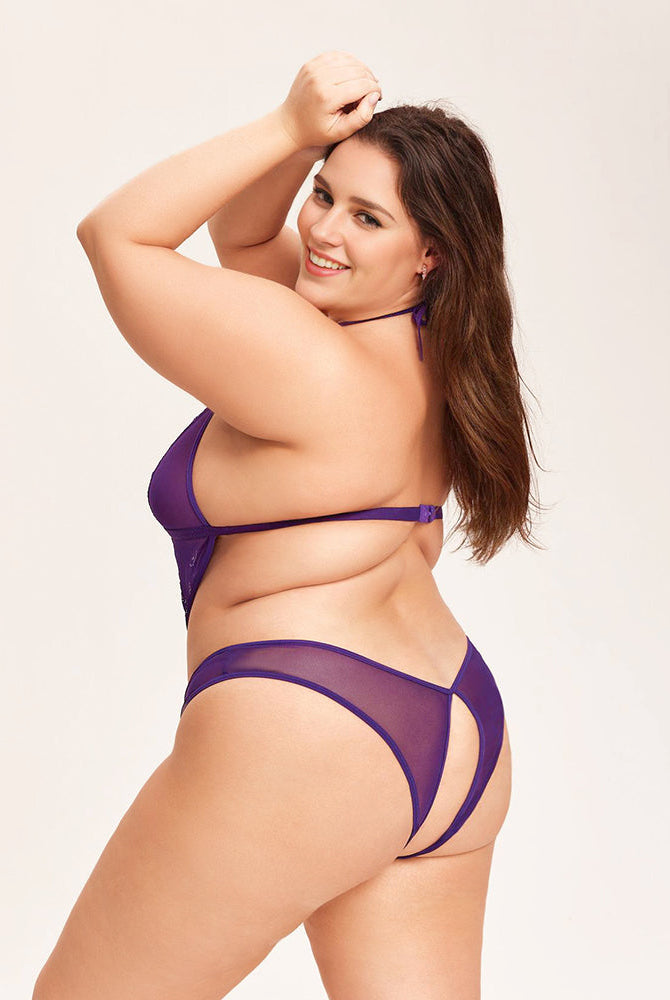 Purple deep V halter teddy bodysuit on a plus-size woman, floral lace details, nightwear lingerie.