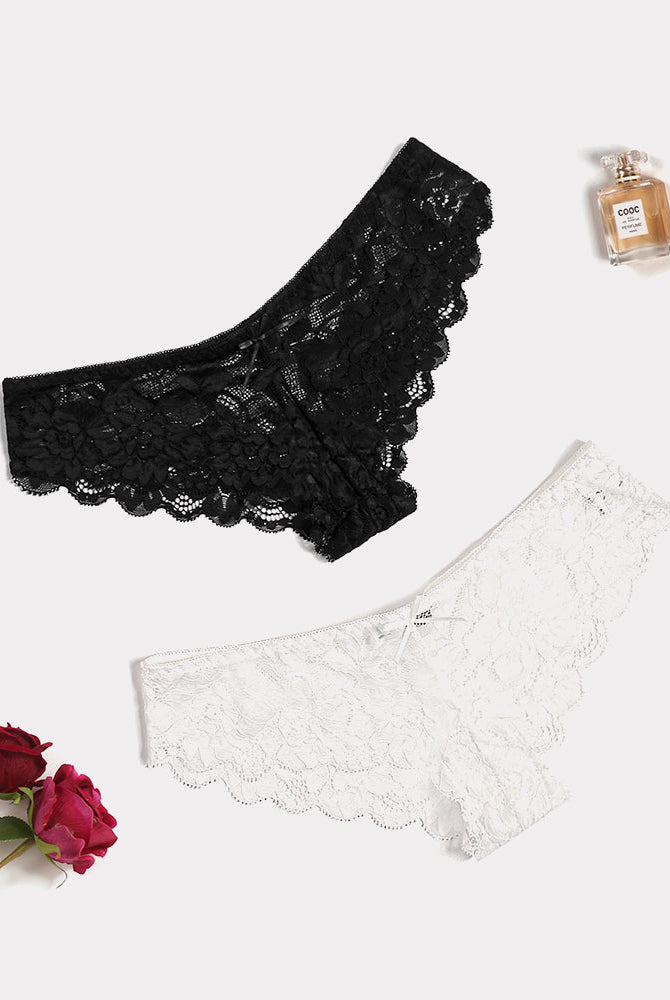 Black and white floral lace hipster panties with small bows. Sheer, comfortable lingerie.