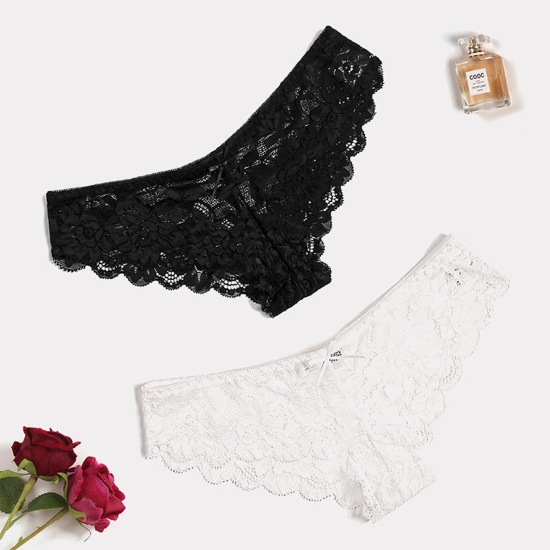 Black and white floral lace hipster panties with small bows. Sheer, comfortable lingerie.