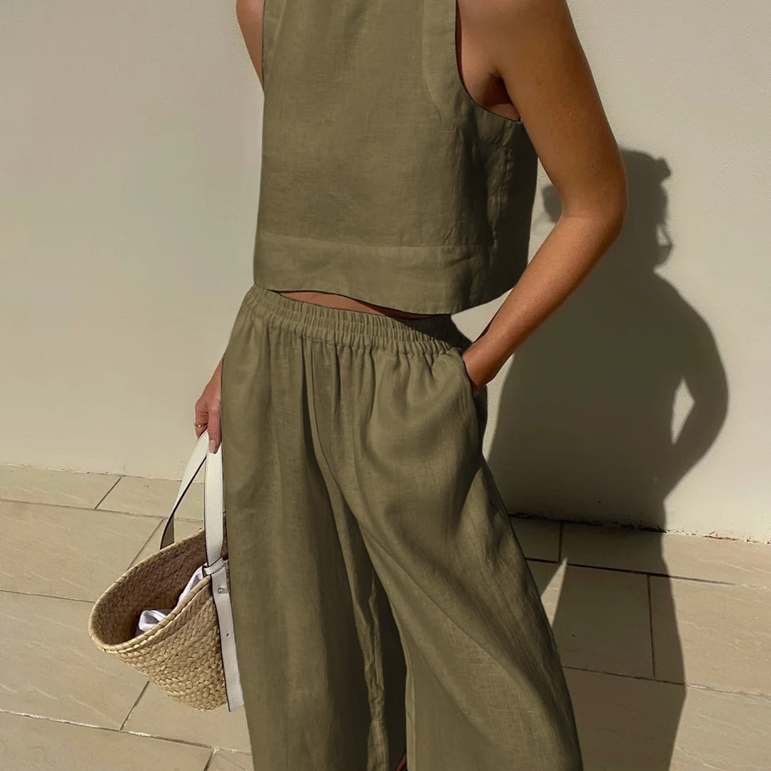 Olive green linen crop top and wide leg pants set. Vacation style, breathable summer outfit.