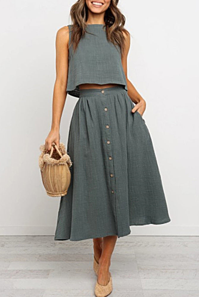 Green Short Vest Midi Skirt Set, two-piece outfit with button detail and woven handbag
