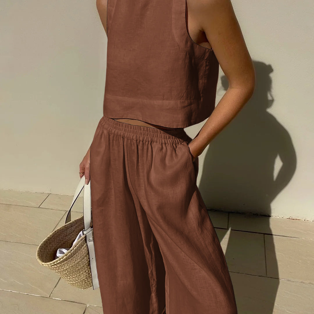 Brown crop top and wide leg pants set made of cotton and linen blend. Vacation style outfit.