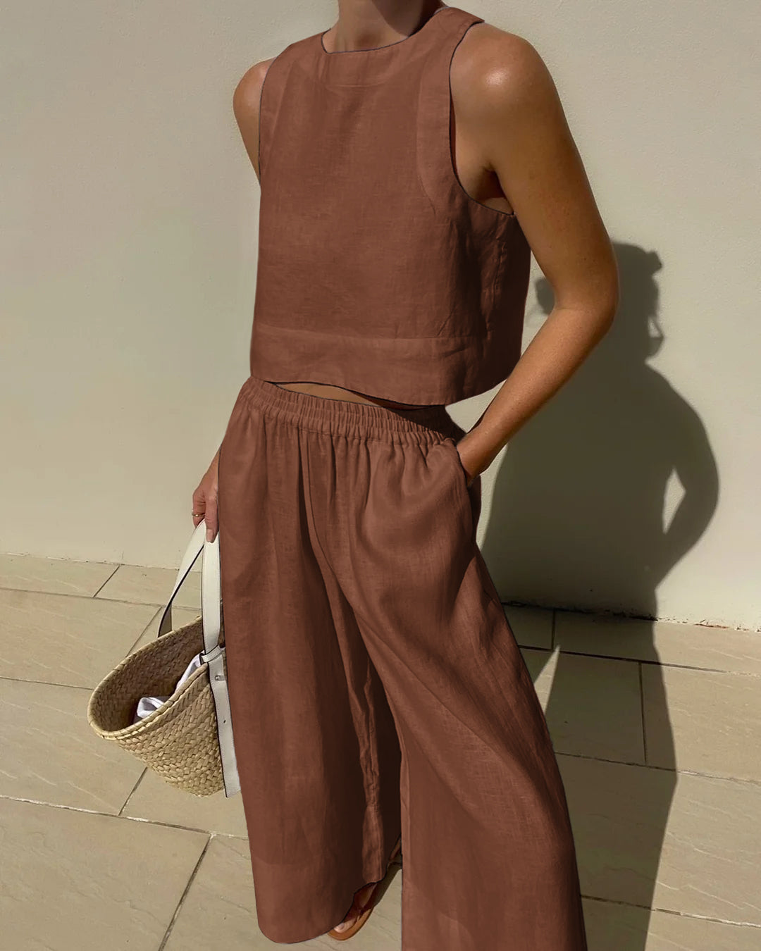 Brown crop top and wide leg pants set made of cotton and linen blend. Vacation style outfit.