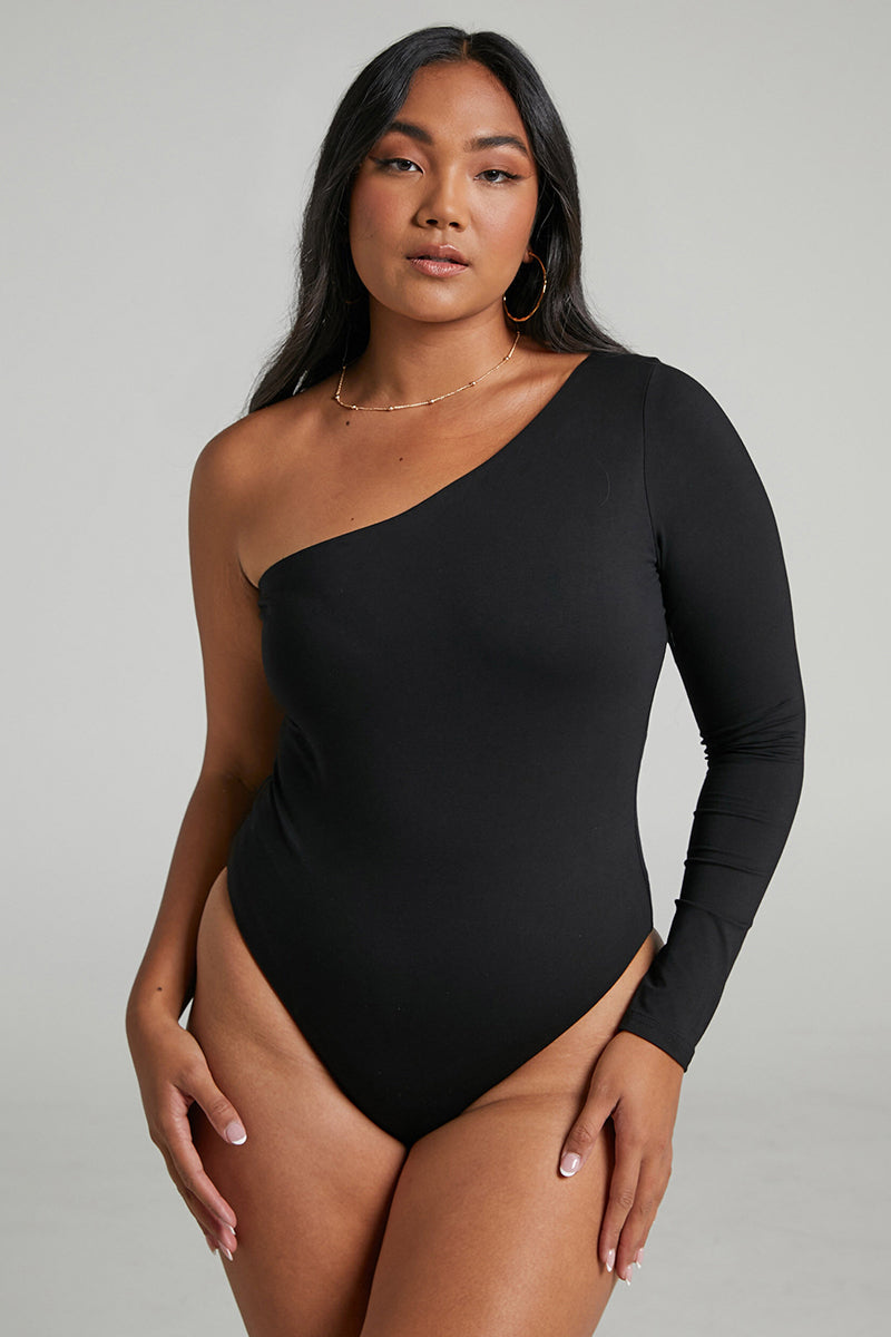 Black one-shoulder bodysuit. Casual style, polyester material. A stylish and comfortable choice.