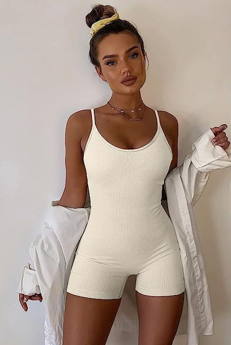 Beige ribbed tummy control romper with spaghetti straps and built-in shorts legs