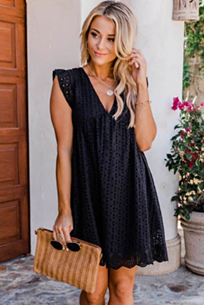 Black lace dress with pockets, V-neck, short sleeves, scalloped hem. Casual summer dress.