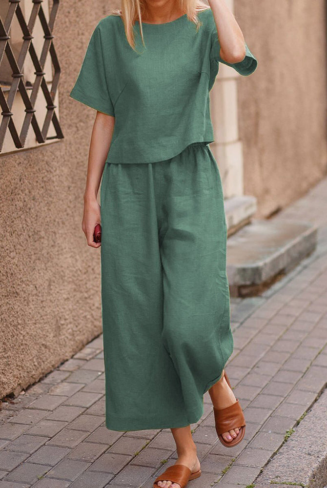 Teal green linen two-piece set for women. Comfortable loose fit top and wide leg pants.