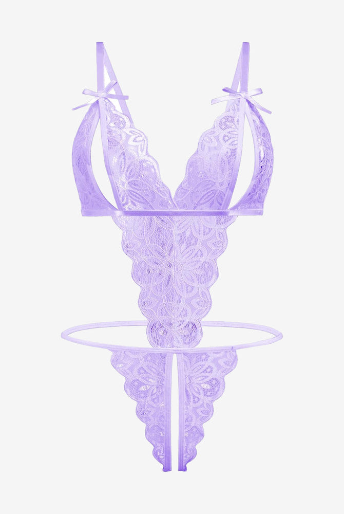 Lavender lace bodysuit with open cup, backless design, and bow details. Sexy lingerie.