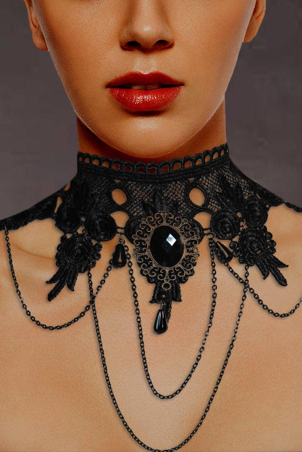 Black lace choker necklace with a central black gemstone and chain details, gothic style.