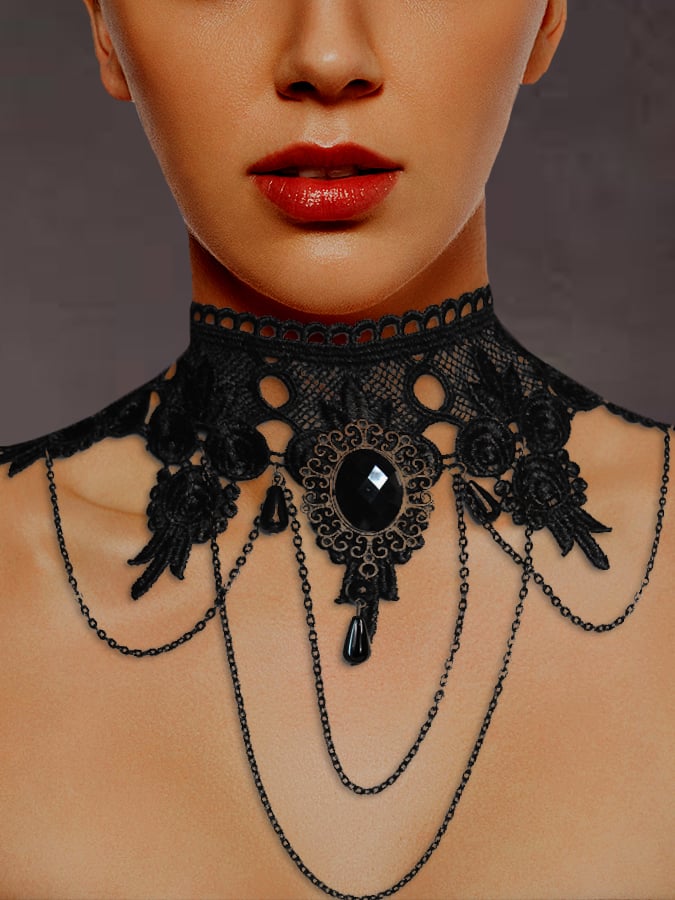 Black lace choker necklace with a central black gemstone and chain details, gothic style.