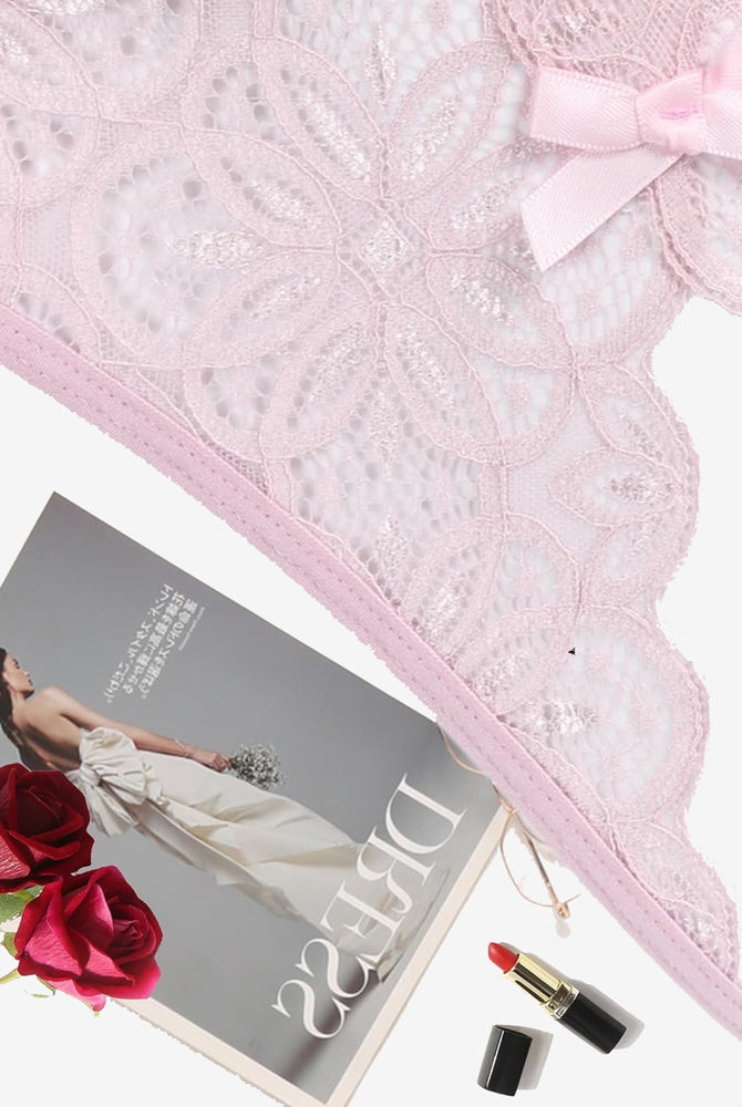 Pink floral lace briefs with bow detail. Sexy low-rise design. Featuring Avidlove lingerie.