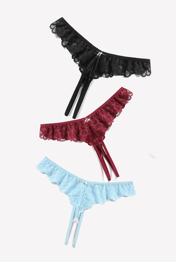 Lace thong briefs in black, burgundy, and light blue with criss-cross design and rhinestone details