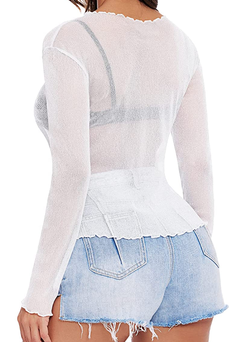 White mesh long sleeve see-through shirt and denim shorts. Stylish and sexy outfit for women.