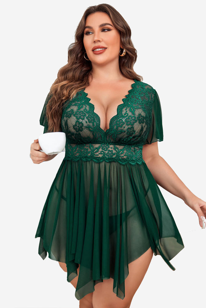 Plus size green babydoll lingerie with lace, deep V-neck, and asymmetrical hem.