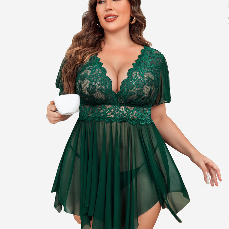 Plus size green babydoll lingerie with lace, deep V-neck, and asymmetrical hem.