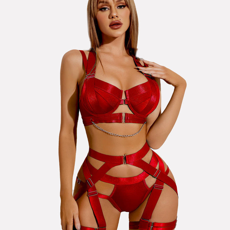 Red lingerie garter set with chain detail, halter bra, and high-waisted straps for women