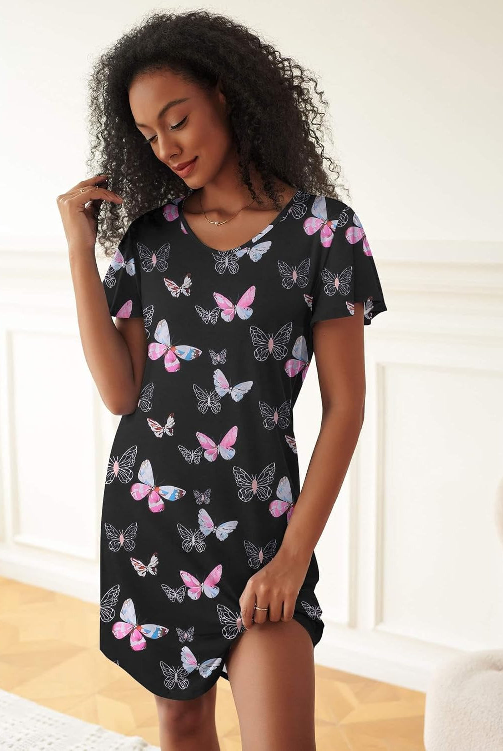 Black butterfly print nightshirt sleep dress with short sleeves and scoop neck.