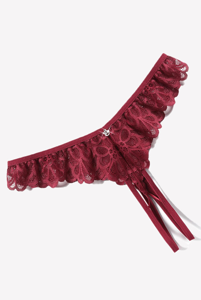 Burgundy lace thong briefs with criss-cross design, ruffle trim, and rhinestone details