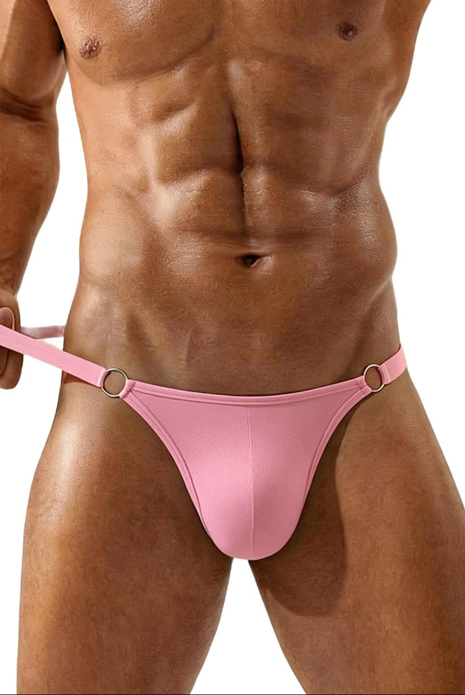 Men's low-rise thong underwear in light pink, low-rise T-back with ring accents