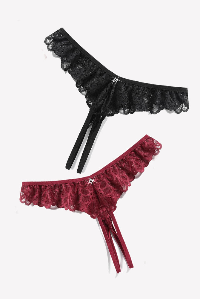 Lace panties in black and burgundy with criss-cross thong design and rhinestone details