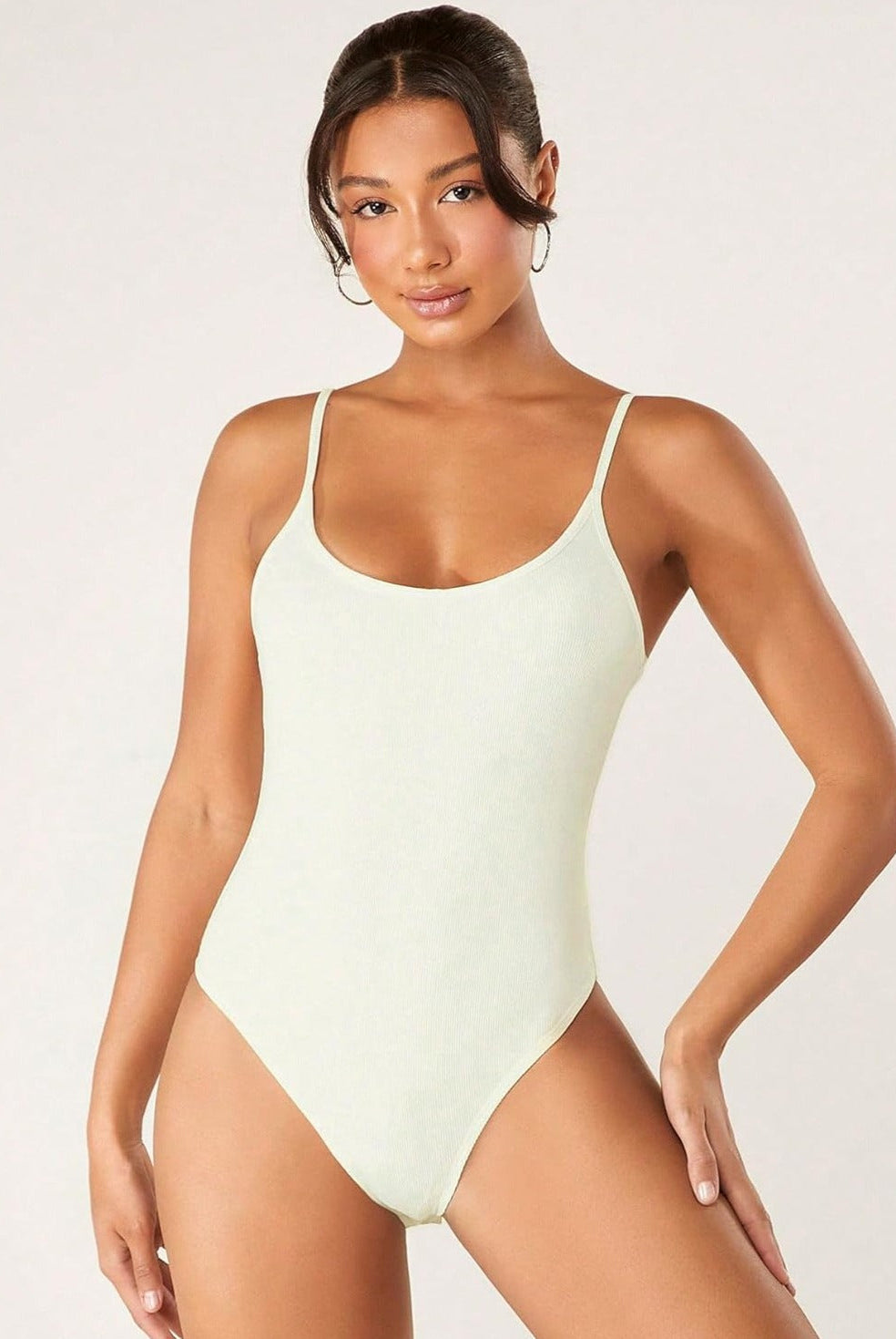 Ribbed tummy control romper in beige with spaghetti straps and scoop neckline