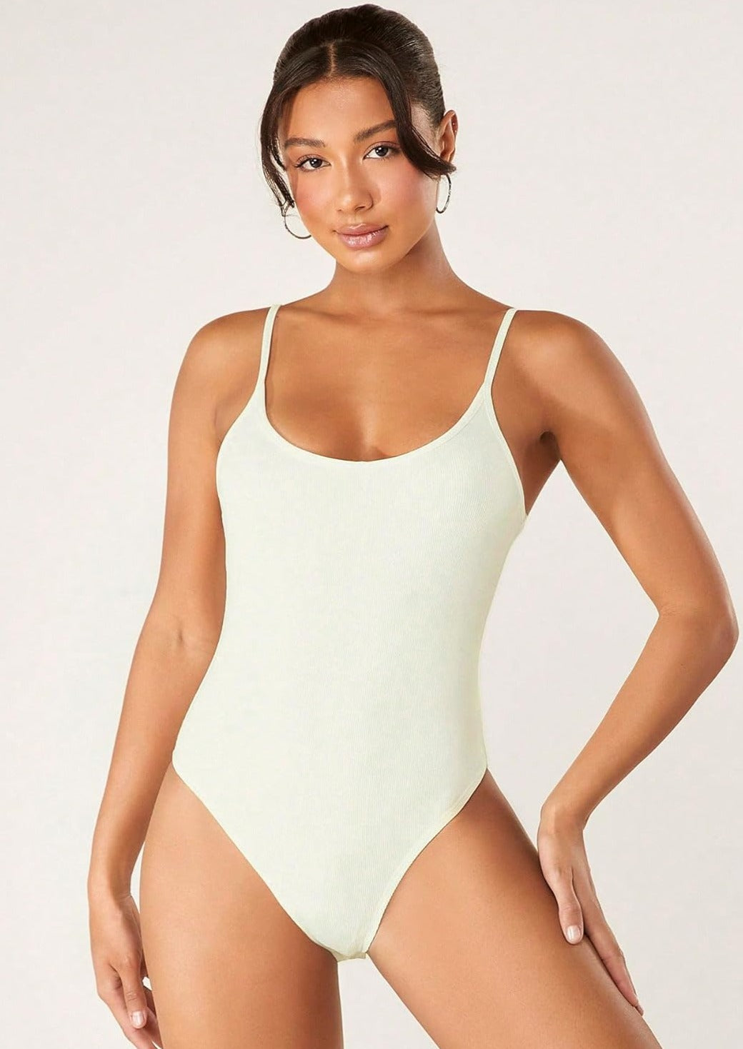 Light green ribbed shapewear romper with spaghetti straps, tummy control, seamless for comfort