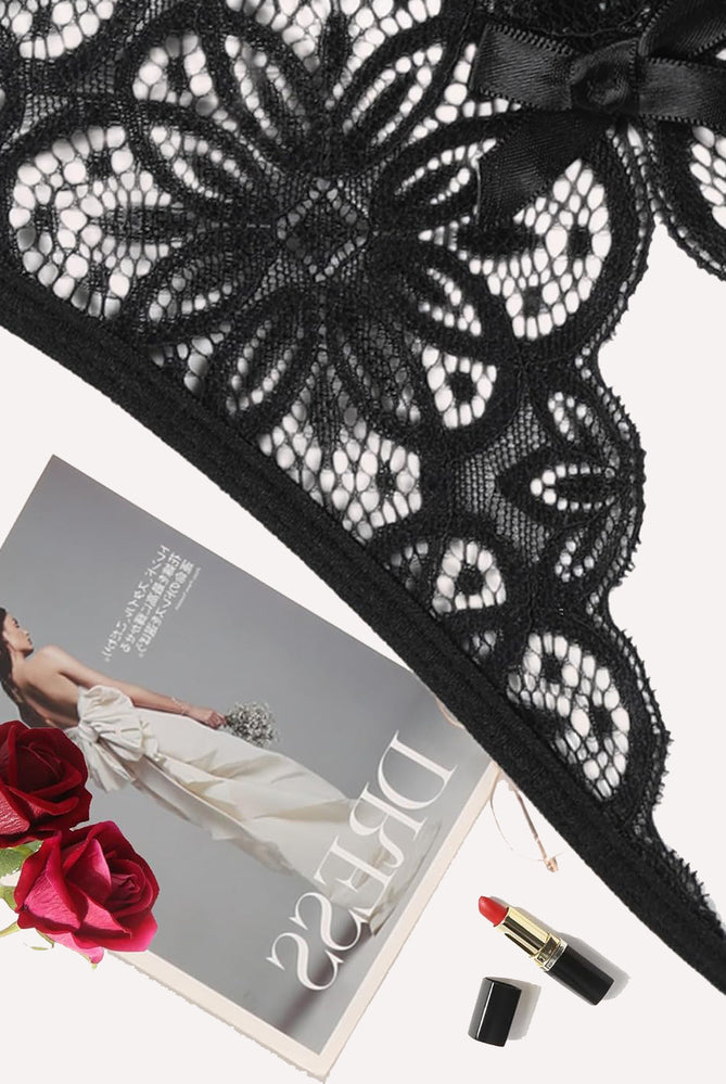 Black floral lace briefs with bow detail. Sexy low-rise design. Featuring Avidlove lingerie.