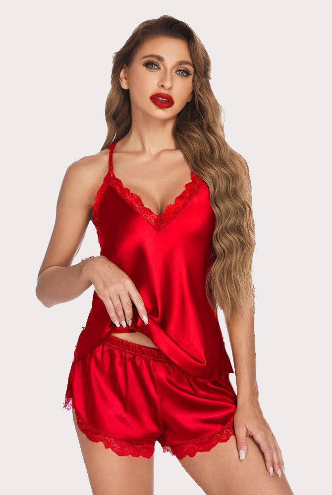 Red satin pajama set. Women's cami shorts set with lace trim. Elegant and comfortable sleepwear.