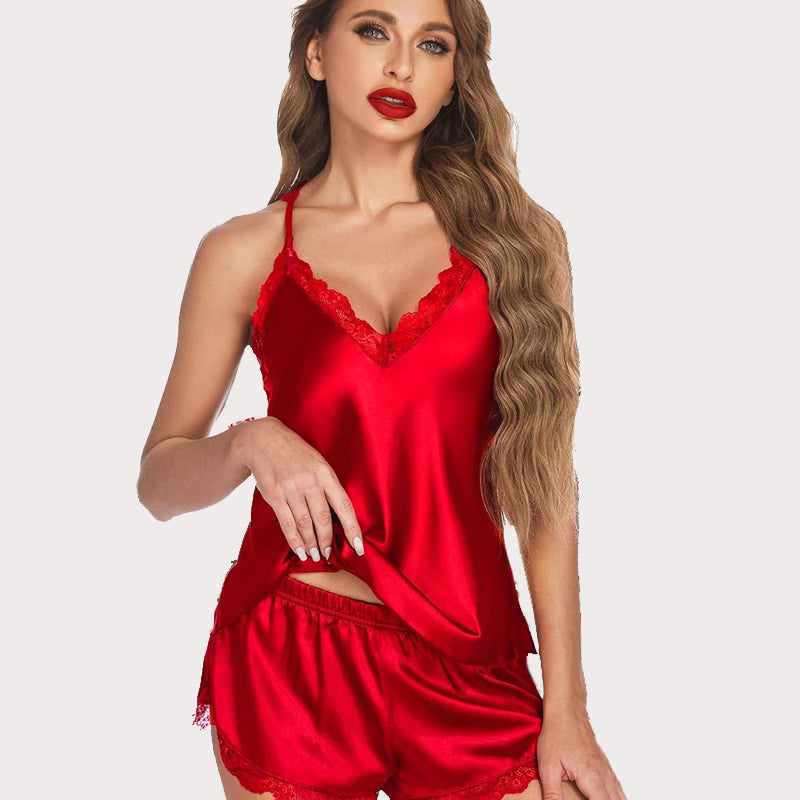 Red satin pajama set. Women's cami shorts set with lace trim. Elegant and comfortable sleepwear.