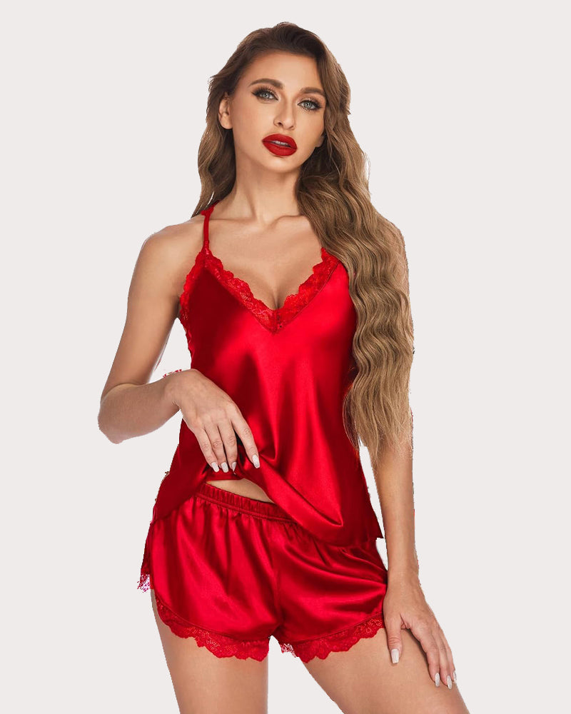 Red satin pajama set. Women's cami shorts set with lace trim. Elegant and comfortable sleepwear.